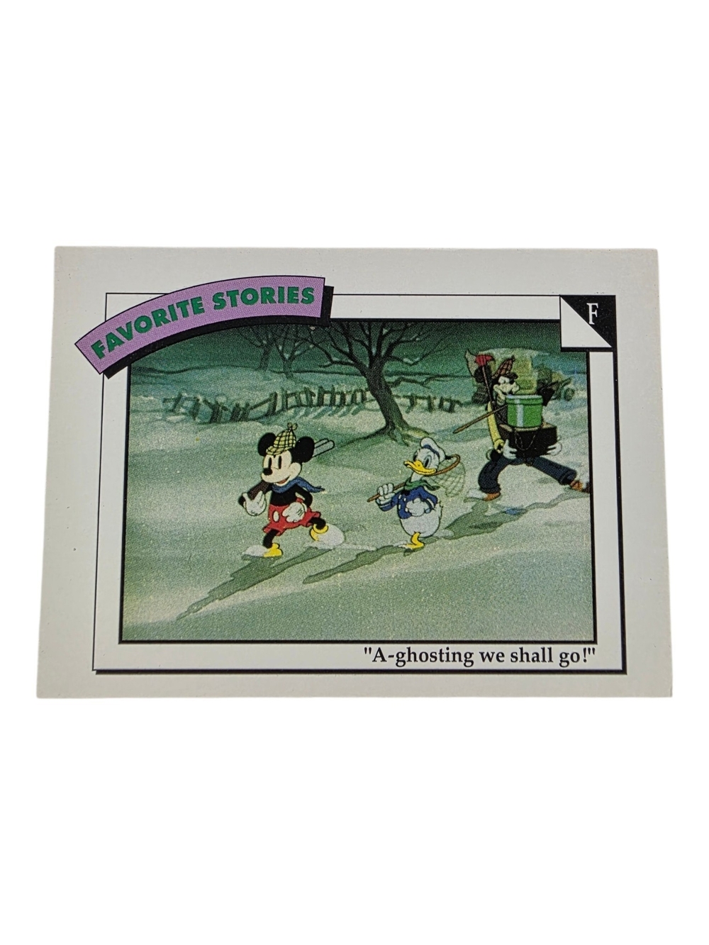 1991 Disney Trading Card with Green Scene, Red, Yellow, Black Accents